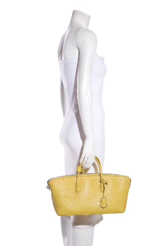 Louis Vuitton bags with spacious interiorsLouis Vuitton Maroquinerie Triangle Yellow Grained Leather Handbag