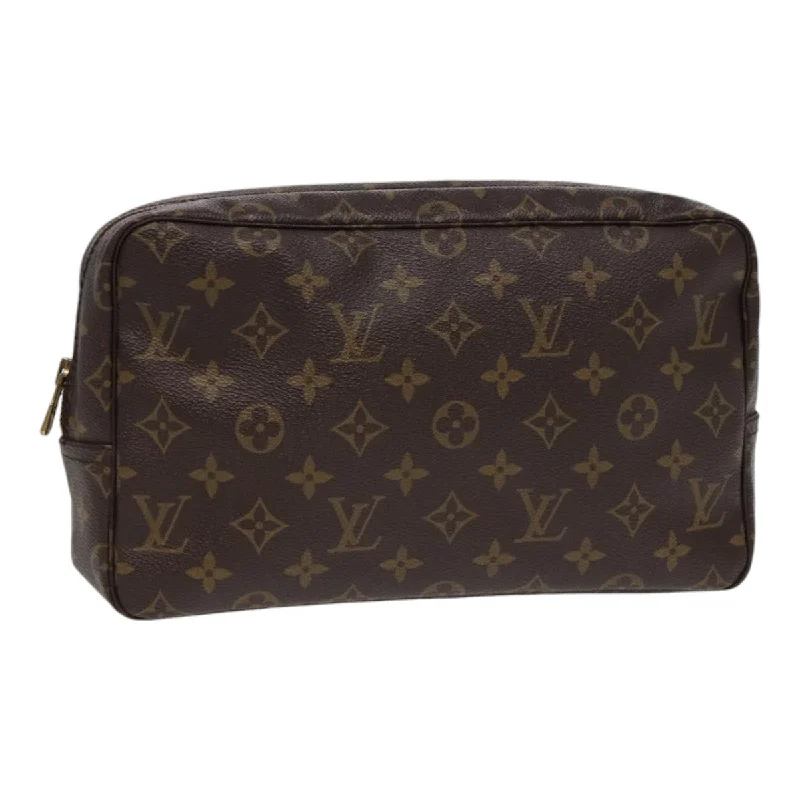 Louis Vuitton bags with leather trimsLOUIS VUITTON Trousse de Toilette Clutch Bag